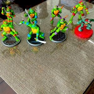 8 Used Teenage mutant ninja turtles toys .